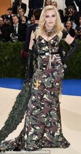 3FD3FEDB00000578-4464478-Fashion_war_Madonna_arrives_to_the_Met_Gala_on_Monday_wearing_a_-a-20_1493710643157